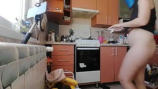Hairy MILF with big tits cooks breakfast naked in kitchen and gets naughty