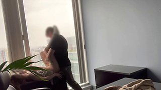 MILF boss fucked at her office window