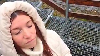 Slutty redhead gives a nice blowjob to an older guy outdoor and takes his cum in her mouth