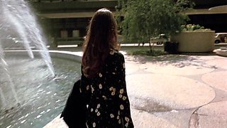 Curvy brunette flashing ass and giving blowjob outdoor