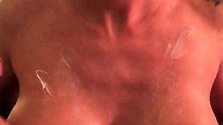 Sensuous MILF housewife massages her fabulous big tits