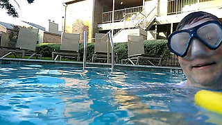 Couple Underwater Diving and Swimming