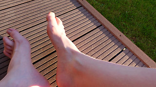 Walking with My Feet on the Grass and Showing Them to You up Close