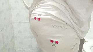 Plump girl takes a shower