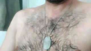 I'm playing with my cock.