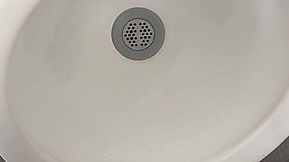 Moaning daddy has a lot of pressure and milks his cock in the public toilet