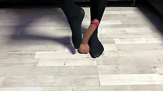 Sexy Dominatrix in Nylon Pantyhose Is Trampling Your Cock