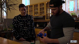 Matthew Camp and Tattooed Enzo Bareback Pound in Dark Studio