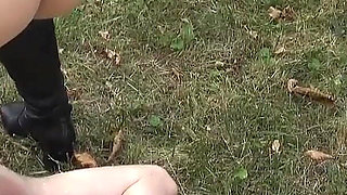 Hot Blonde MILF Pissing on Her Slave in the Backyard