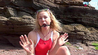 Gagged on the Beach Dripping and Drooling Down My Swimsuit