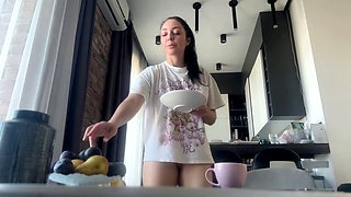 Sexy fit brunette does chores without any panties on