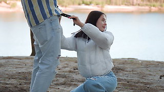 Risky Blowjob on the Beach