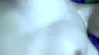 Malaysian babe outdoors with political party flags.