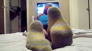 Goth girl dominates with smelly socks in POV foot worship session