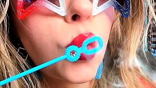 Petite Mercy - Poppy Red Lipstick Blowing Bubbles