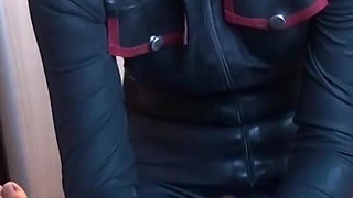 Latex Danielle plays in latex costume with his cock