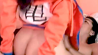 Mexican woman with a brunette wearing Dragon Ball sweater