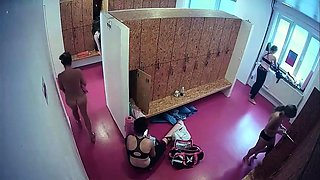 Hidden cam films amateur babes undressing in a locker room