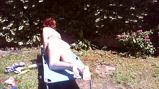 Nicoletta Sunbathes in a Public Garden Wearing a Big Dirty Diaper
