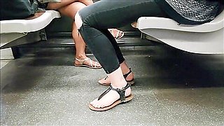 Blonde & Asian Feet On The Metro (faceshot)