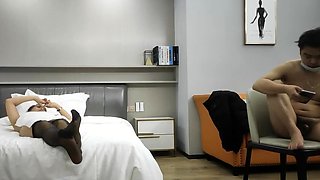 Cute amateur asian web cam girl playing with her toy