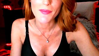 Horny British mature redhead masturbating