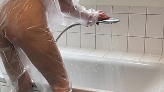 Sue, Cleaning the Bathroom in a Pvc Suit!