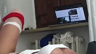 Laura wearing stockings and high heels is bound on the bed, her mouth and pussy fucked