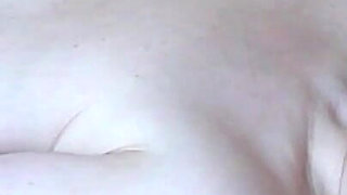 Granny Anika Sucks Her Saggy Tits.