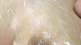 Mom vibrates her big tits with her big vibrator