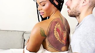 Tattooed ebony babe rides schlong with her fat booty