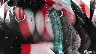 A sexy girl shows off her pierced tits at home