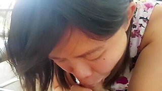 Asian slut wife in dress stripped and giving head on all fours