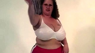 Busty curly brunette with big boobs fucks on couch