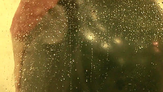 Sexy MILF in latex rubber - Shower striptease