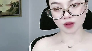 Woman with wet breasts glasses