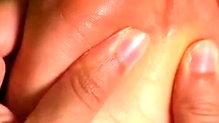 MILF in fishnet enjoys foot fetish