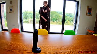 Red XXX teases and pleases herself on the tabletop