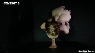 Skinny pigtails and a blowjob through the gloryhole