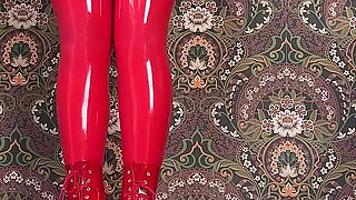Red Ballet Boots on Wooden Floor
