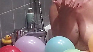 Taking a Bath and Playing with Balloons
