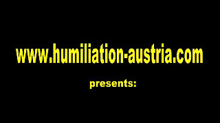 Sucking her strapon dildo