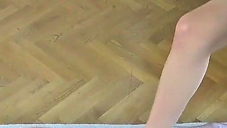 Beautiful and Skinny Babe Playing with Her Feet and Her Slave