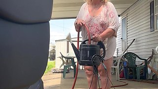 Watering Flowers Flashing Tits and Ass