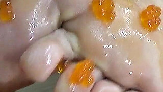 Wrinkled Legs of a MILF with Red Caviar