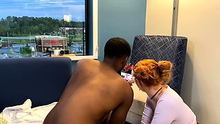 Stacked redhead MILF rewards black lover with special titjob