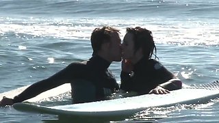 Brunette Nikki Hearts enjoys a steamy beach romp with her hunk in wild positions