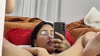 Wet Latina solo play with intense hand action and moans