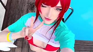 Cosplay redhead teen seductress posing in bikini in the pool