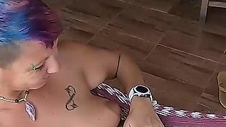 Wife's Getting a Cock in Her Mouth While She Is Lying in the Hammock